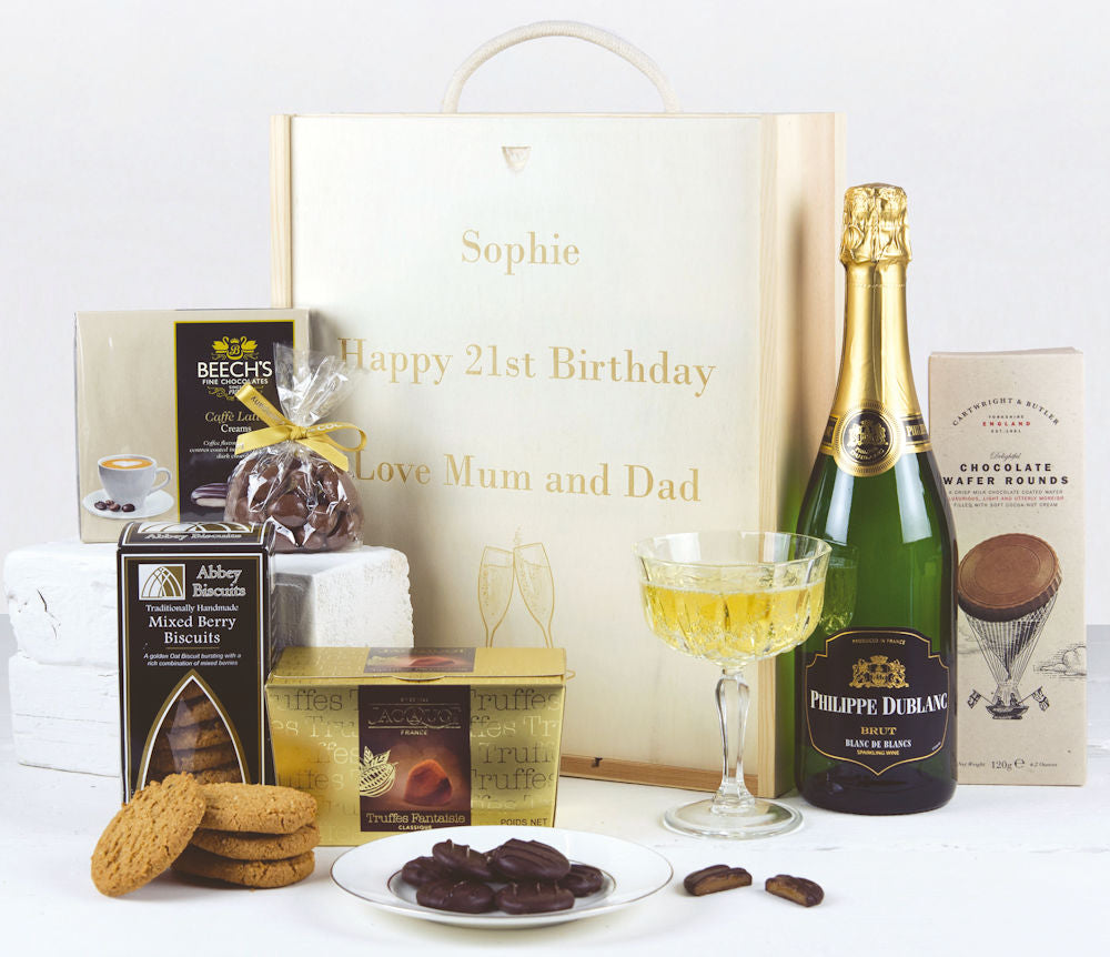 Personalised wooden gift box with a bottle of sparkling wine and tasty treats