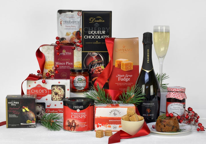A Bottle of Prosecco, Christmas pudding, mince pies, liqueur chocolates, fudge and other tasty treats