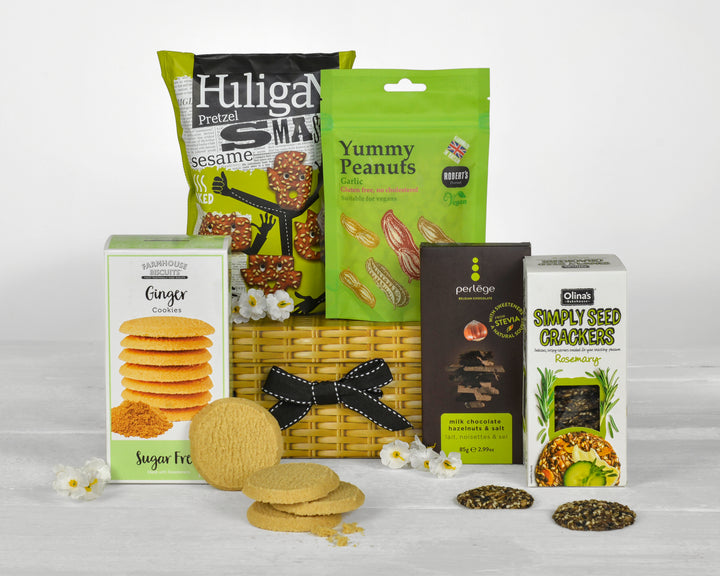 Low sugar treats including chocolate, biscuits, nuts and savoury snacks in a gift box
