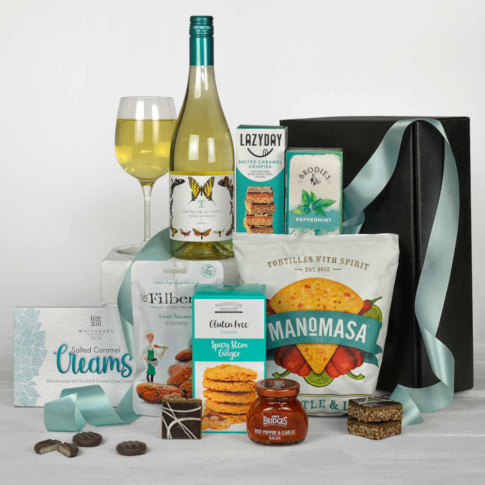 A bottle of white wine, savoury snacks, sweet treats, tea and chocolates. All products are Gluten Free and in a black gift box.