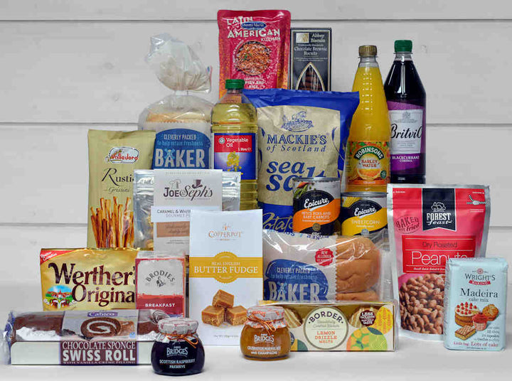 Pantry food items including crisps, nuts, cake mix, cordial juice, sweets, cakes and other tasty food items.