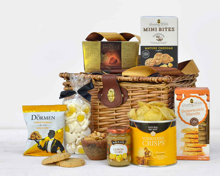 Luxury Willow Basket with chocolaes, biscuits, sweets, lemon curd and some savoury snacks
